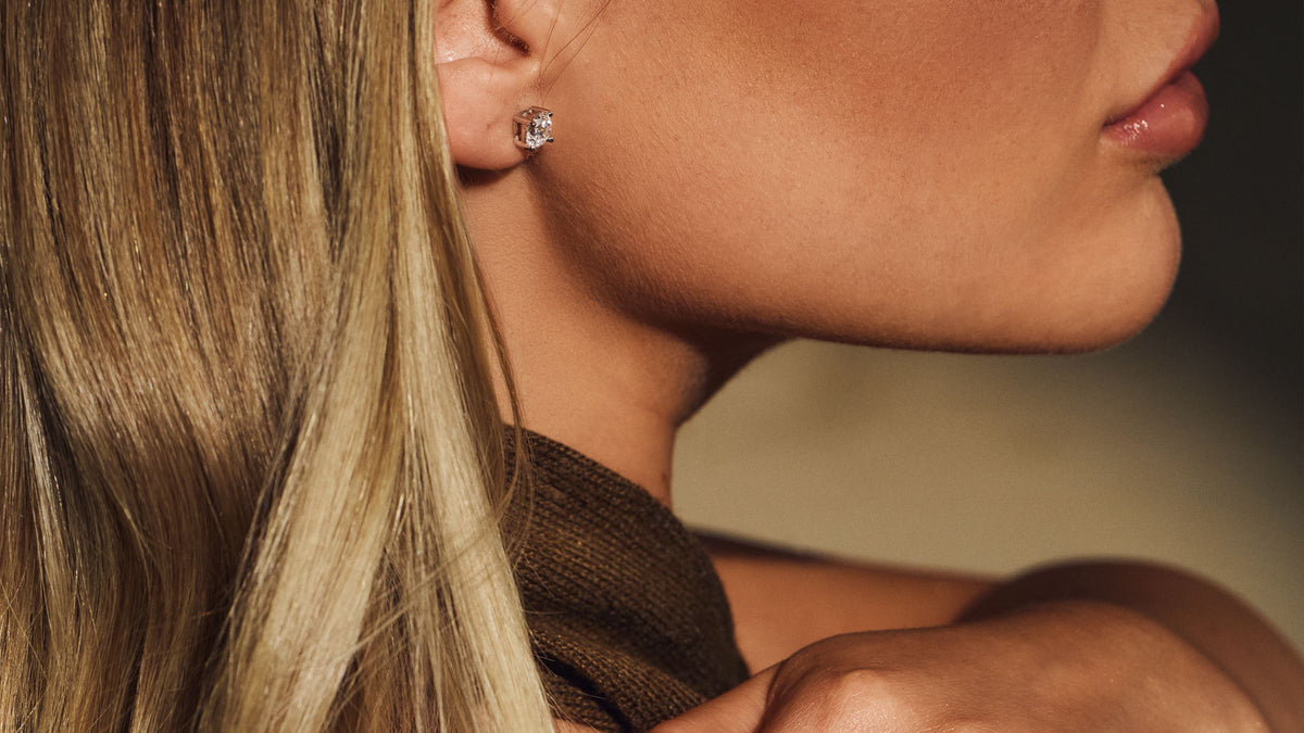Profile close-up with a diamond stud earring