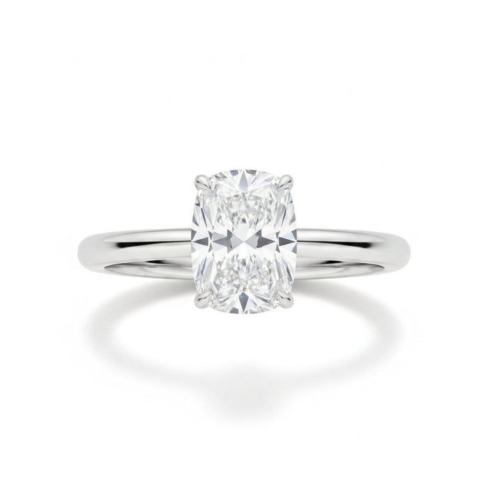 Cushion solitaire engagement ring in white gold, lab-grown diamond, front view. Creation Paul H